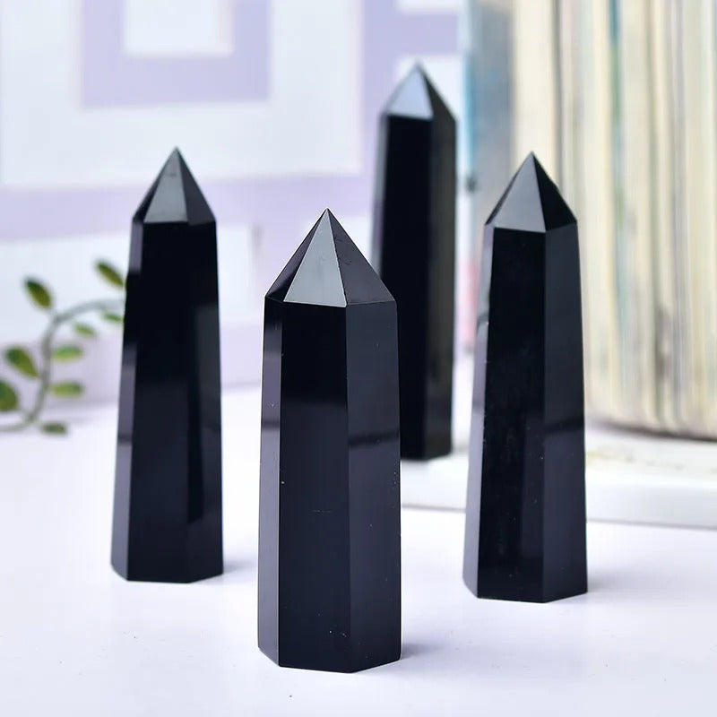 Pointe osidienne noire naturelle quatre