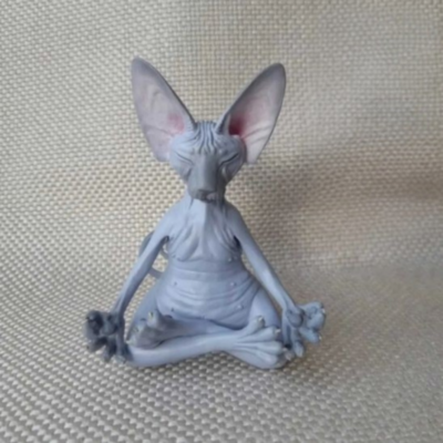 statue chat meditation gris