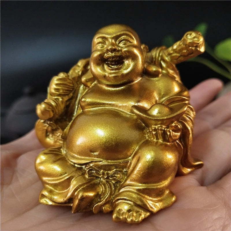 statue bouddha rieur main