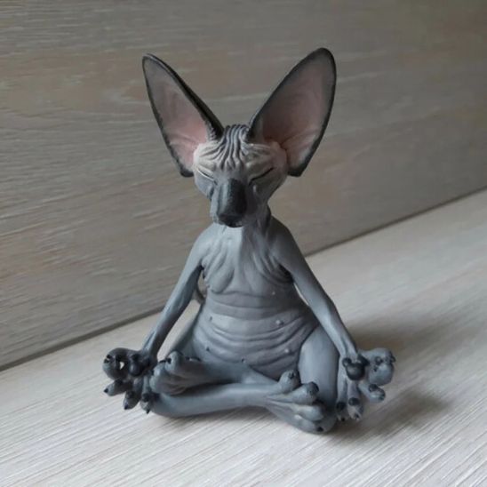 statue chat meditation noir