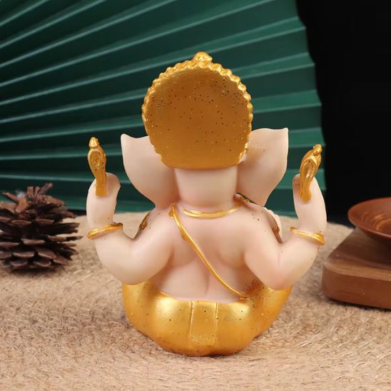 statue ganesh dore dos
