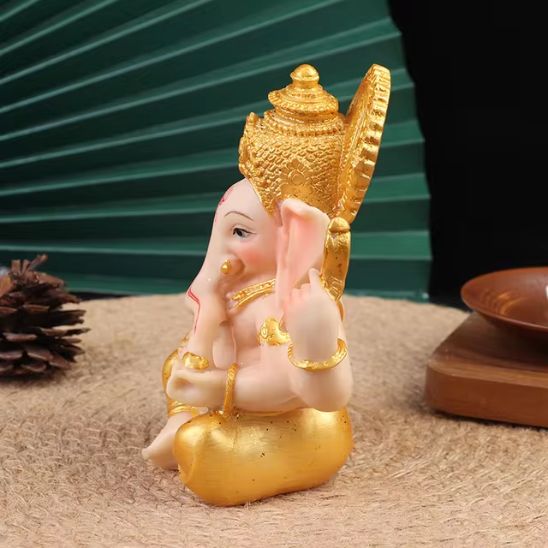 statue ganesh dore profil