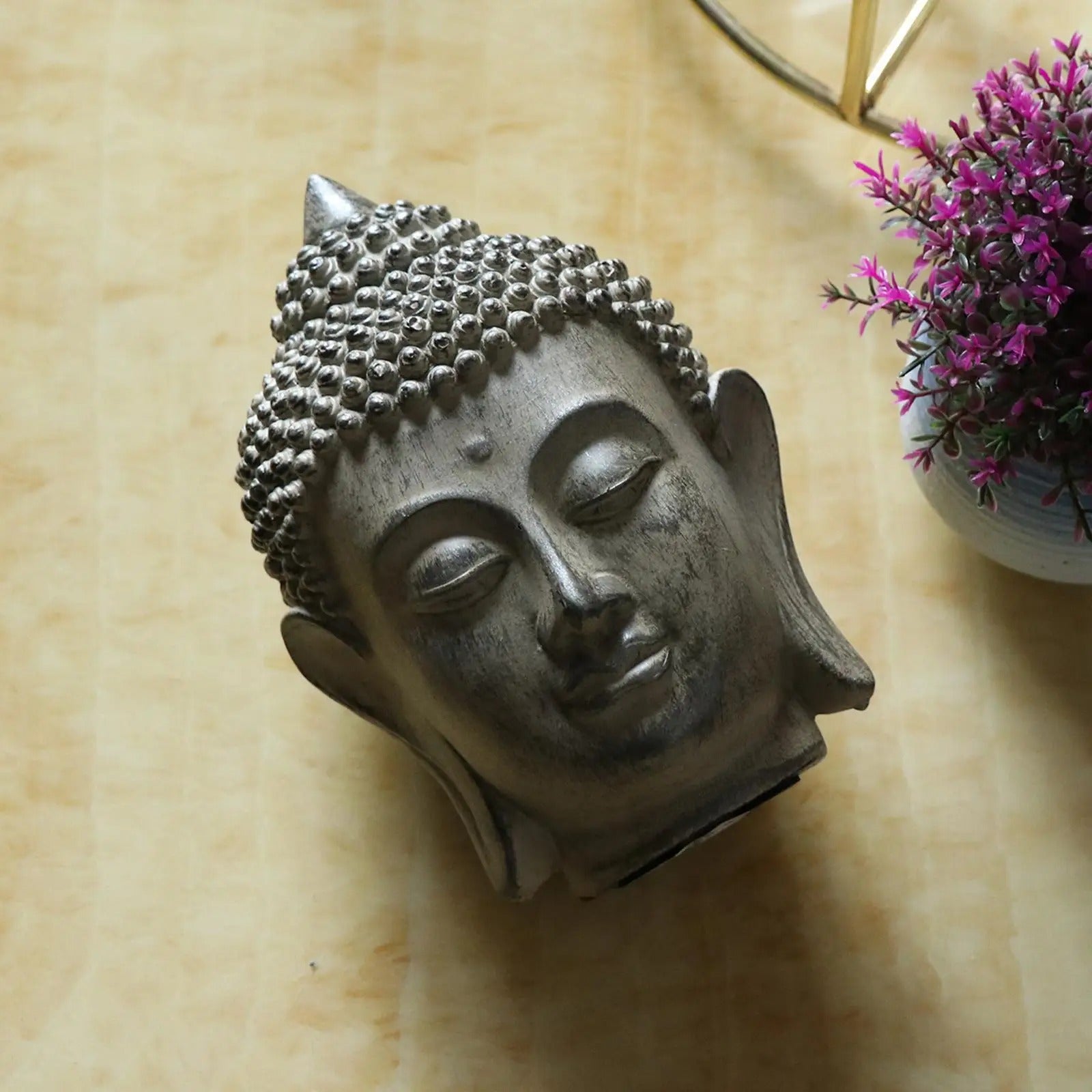 statue tete bouddha couche